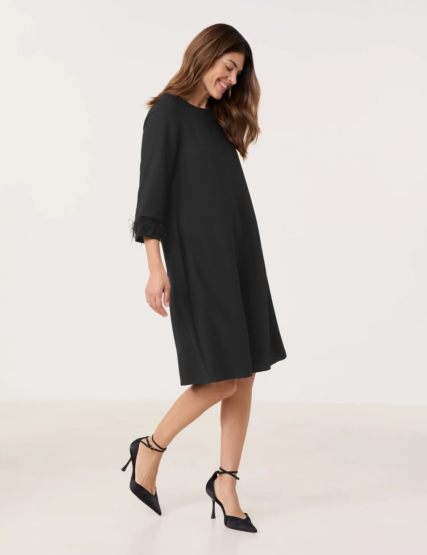 Dress with Decorative Sleeve Hem